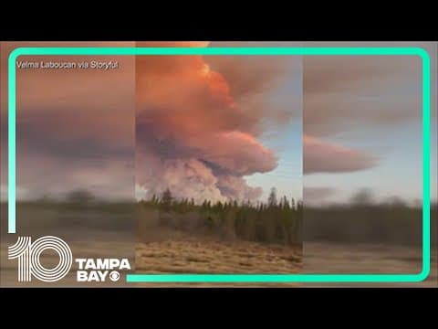 Giant plume of wildfire smoke lights up sky across Alberta, Canada