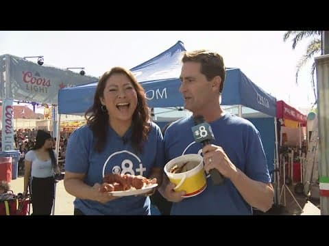 Marcella Lee and Jeff Zevely have fun talking and eating at the San Diego County Fair!