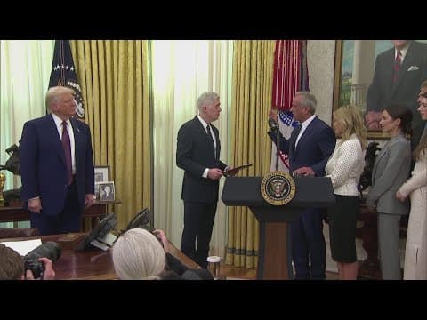 Vaccine skeptic Robert F. Kennedy Jr. is sworn in as Trump's health chief after a close Senate vote