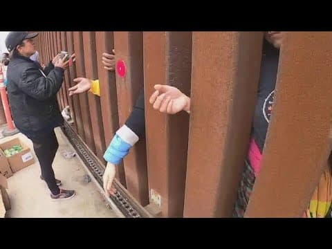 One day before Title 42 expires, thousands of migrants line up along U.S.-Mexico border wall