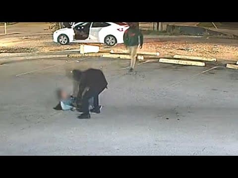 Woman tackled, robbed in parking lot near Heights