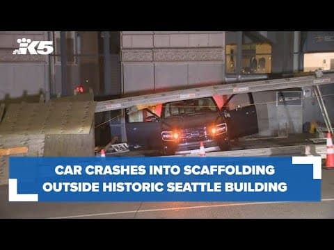 Car crashes into scaffolding surrounding Times Square building in downtown Seattle
