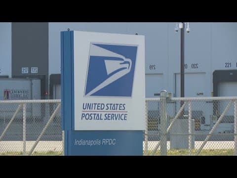 Why are there delays at the USPS hub in Indianapolis?