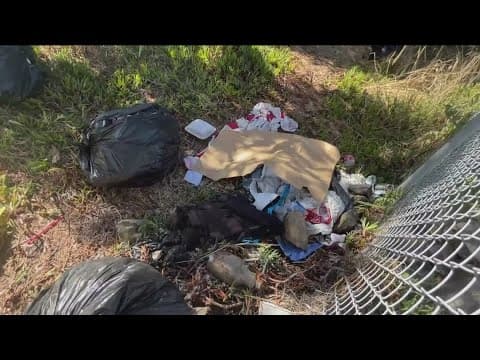 Trash continues to litter the Ocean Beach bike path