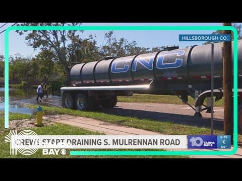 Crews start draining floodwaters South Mulrennan Road in Hillsborough County