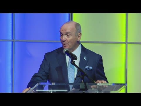 Chuck Lofton receives Lifetime Achievement Award from Downtown Indy Alliance