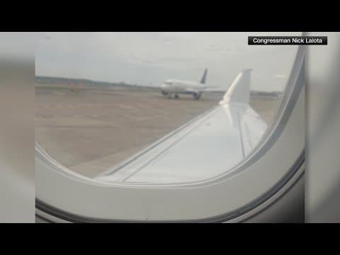 Plane bumps into wing at Reagan National Airport