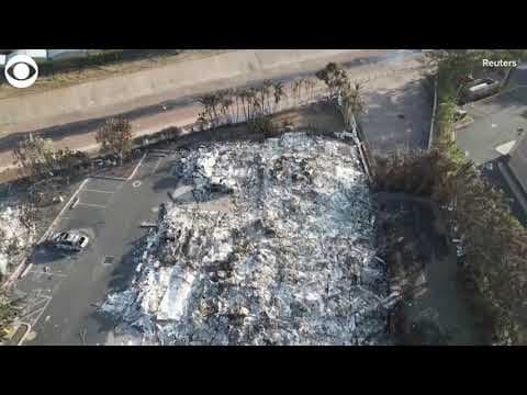 Drone footage shows smoldering debris after wildfire rips through Lahaina, Hawaii