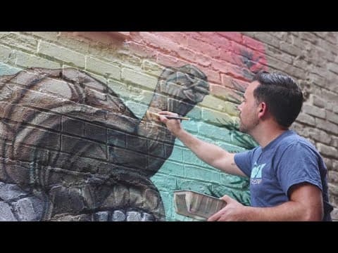 Zoo Knoxville unveils new downtown Knoxville mural