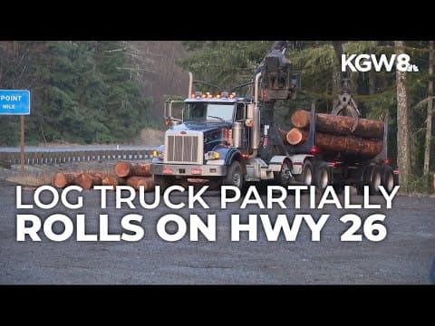 Highway 26 opens after car crashes into log truck