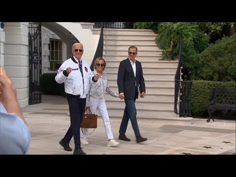 Biden departs from White House sporting a Team USA jacket
