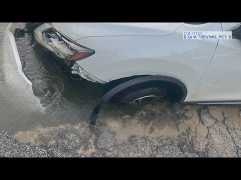 Apparent water main break causes pavement collapse in SE Harris County