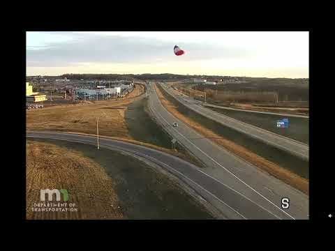 Hot air balloon hits power line near Minnesota highway, basket breaks off and crashes below