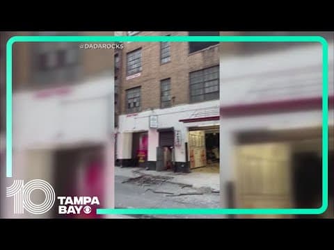 Bystander shows cars hanging from parking garage collapse in New York City