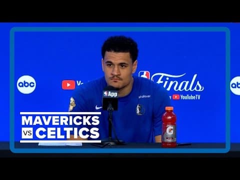 Dallas Mavericks guard Josh Green gives postgame interviews after Game 5 of the NBA Finals