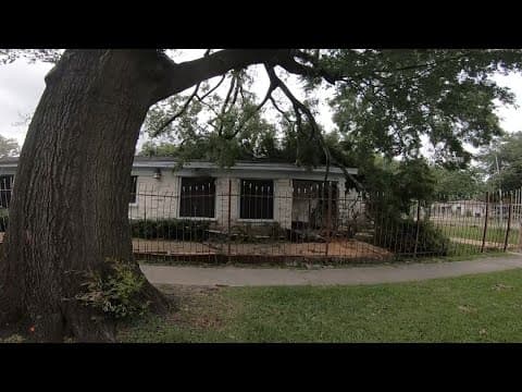 Houston family cleans up damage after part of large tree on city's property falls on their house