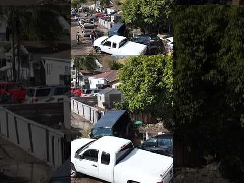 Drone captures flood damage above San Diego homes after powerful storm batters the city