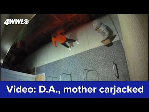 Security camera footage of DA Williams and mother carjacked by armed suspects