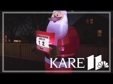 Blow-up Santas take over MN neighborhood