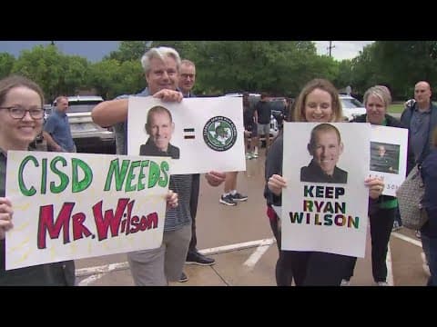 Parents protest in Carroll ISD in support of a school principal