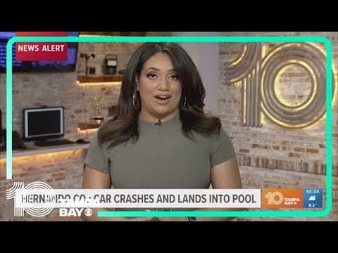 Car crashes and lands in pool in Spring Hill