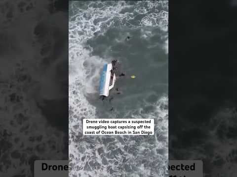 Drone video captures a suspected smuggling boat capsizing off the coast of Ocean Beach in San Diego