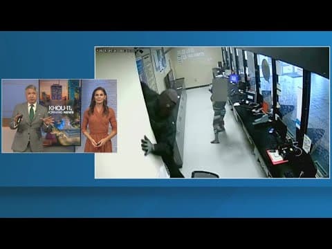 Caught on camera: Robbers fall from ceiling at Georgia check cashing business