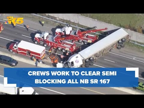 Crews work to clear overturned semi-truck in Algona