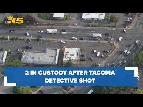 Two in custody after Tacoma detective shot