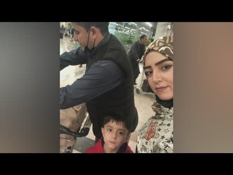 Flooded apartment complex forces Afghan refugee family with newborn to evacuate