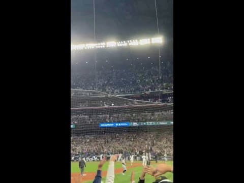 Mariners fans celebrate their win in Game 5 of the ALDS