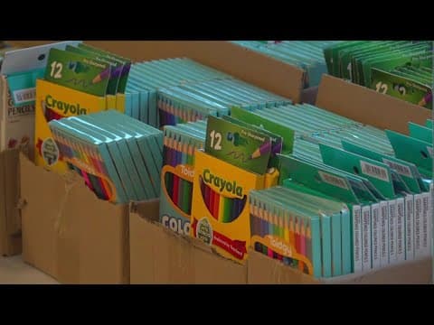 Volunteers pitch in for back-to-school supplies drive