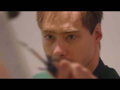 Bethesda nonspeaking artist uses paint brush in fight to be heard