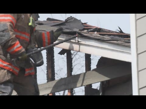 Two fires damaged a house and several townhomes in North Texas