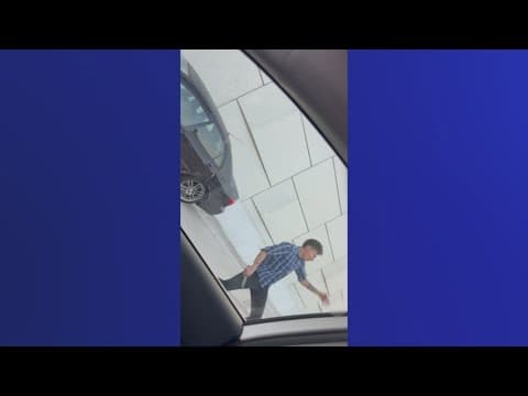 Video shows moments when a highway crash turned into a stabbing