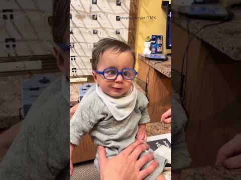 Toddler in Staten Island smiles after getting glasses. Via: TMX