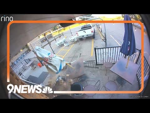 Security camera captures men using truck to pull an ATM through a Denver bar's window