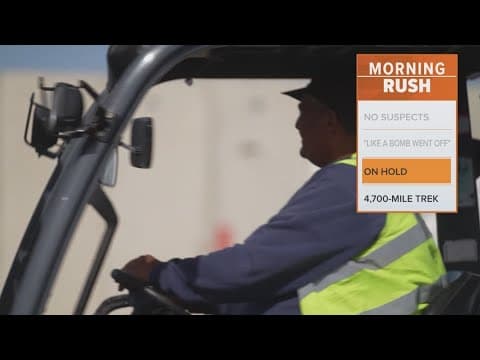 Officials pause aid deliveries, blaming looting