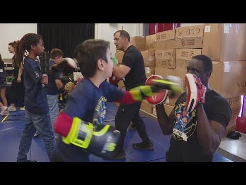 Perkins Elementary students learn self-defense techniques with 'Jui Jitsu with a Cop' event