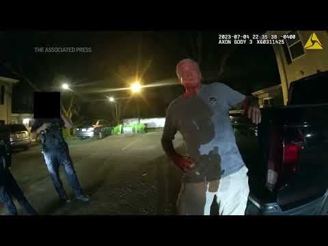 Body cam shows prolific federal drug prosecutor offering cops business card in DUI crash arrest