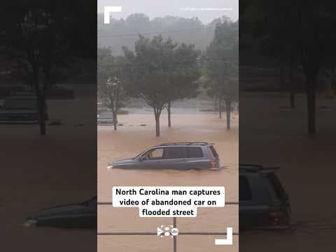 North Carolina man captures video of abandoned car on flooded street