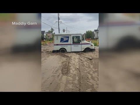 'Neither rain, nor snow, nor sleet, nor hail' – but what about mud? Mail truck gets stuck in Gentill