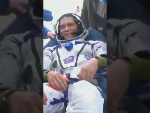 Astronaut returns to Earth after record flight