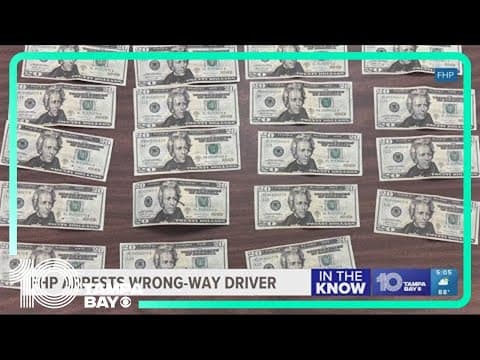 Wrong-way driver had counterfeit bills, police say