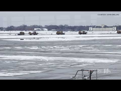 Crews prep tarmac at MSP Airport ahead of major winter snow storm