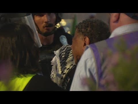 Hundreds gather in anti-ICE protests, later turning rowdy after nightfall