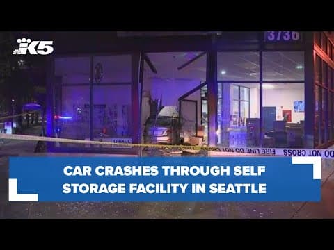 BREAKING: Car crashes through Seattle storage facility