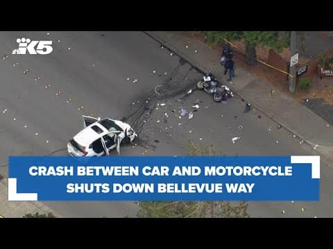 AERIALS: Police motorcycle, car crash shuts down Bellevue Way