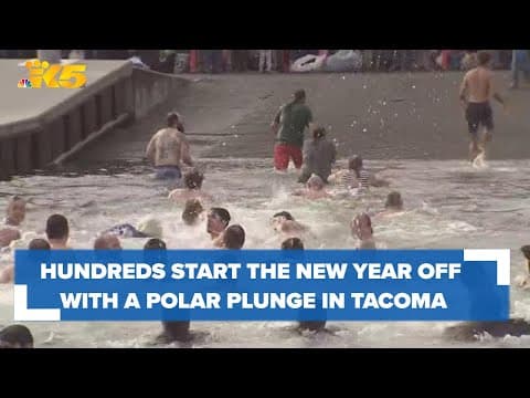 Hundreds start the new year off with a polar plunge at Tacoma's Point Defiance Marina