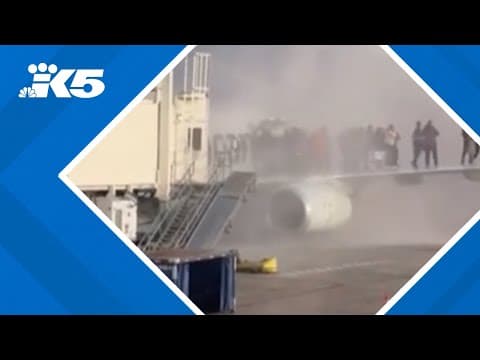 Video shows passengers evacuating from burning plane in Denver
